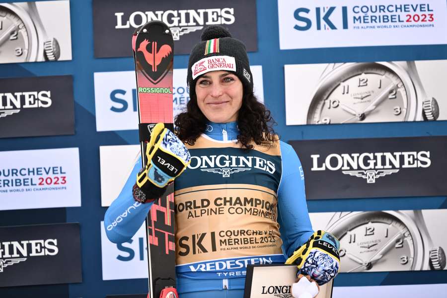 Federica Brignone celebrates on the podium