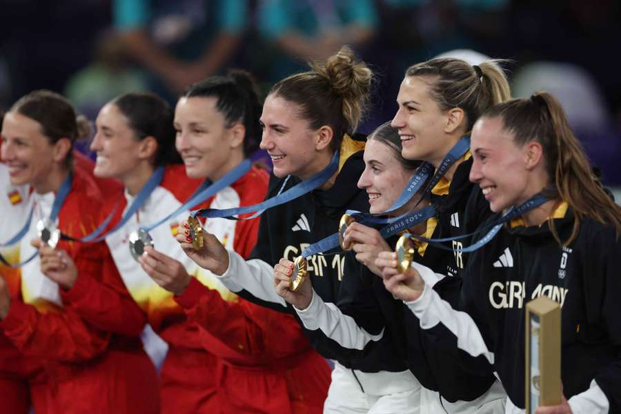 Germany and Spain's teams pose with their medals