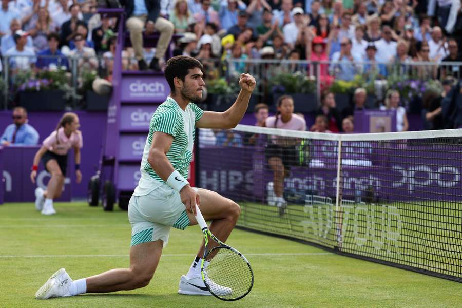 Carlos Alcaraz reacts after scoring a point against Arthur Rinderknech