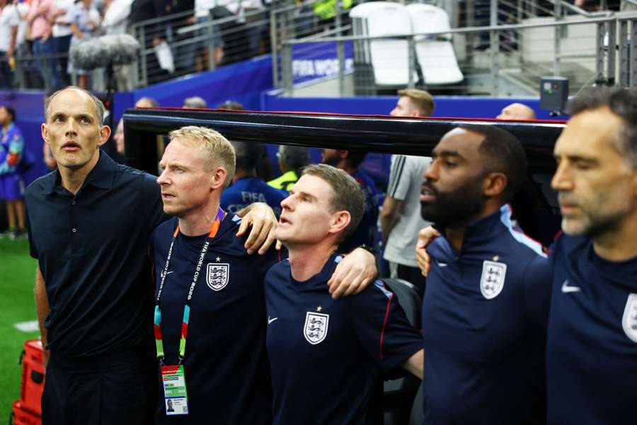 Tuchel (L) and his staff before the match Tuchel (L) and his staff before the match