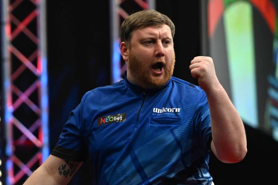 Cameron Menzies, pictured competing at the German Dart Grand Prix earlier this year