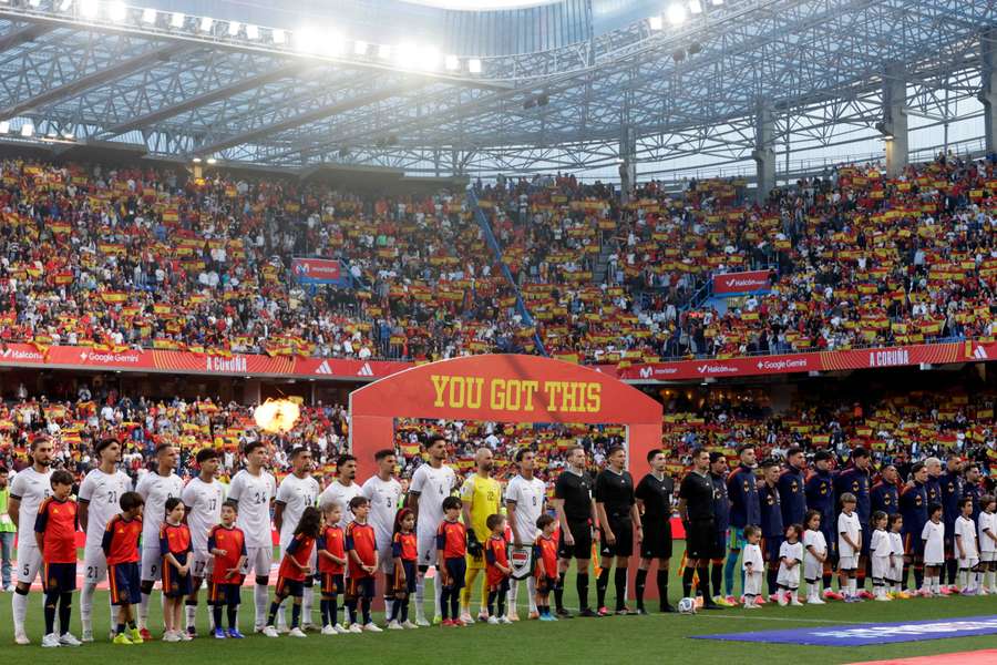 Iraq and Spain players before the game