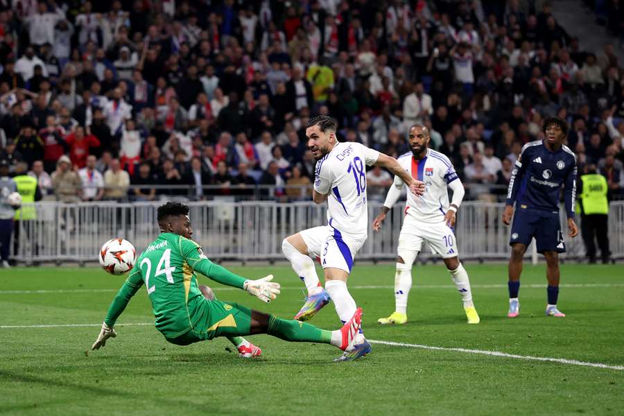 Rayan Cherki slots past Andre Onana to earn a draw for Lyon