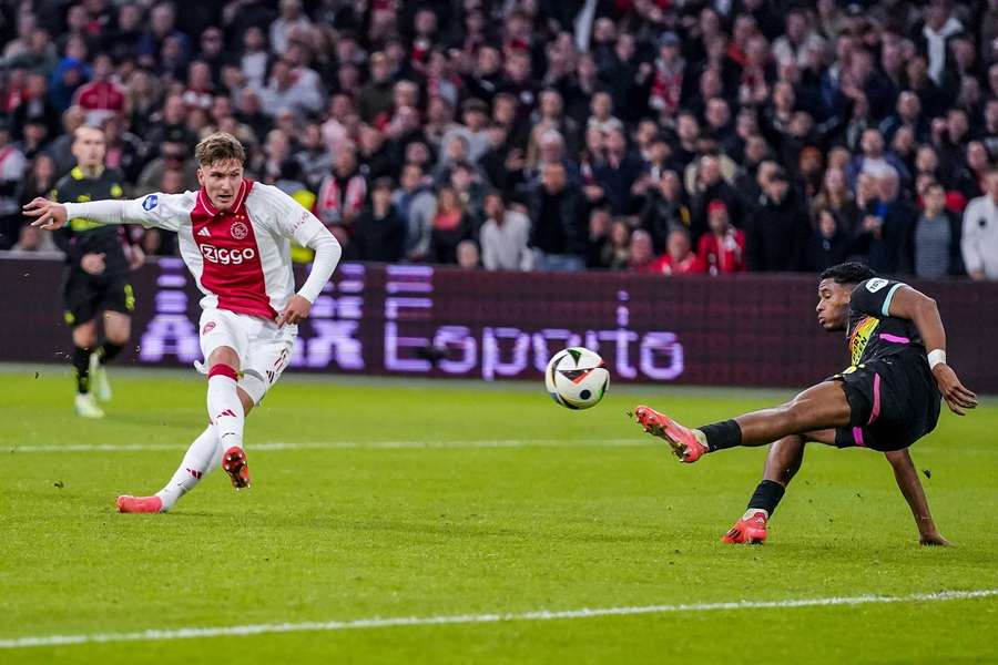 Ajax's Mika Godts decided the only other meeting with PSV earlier this season