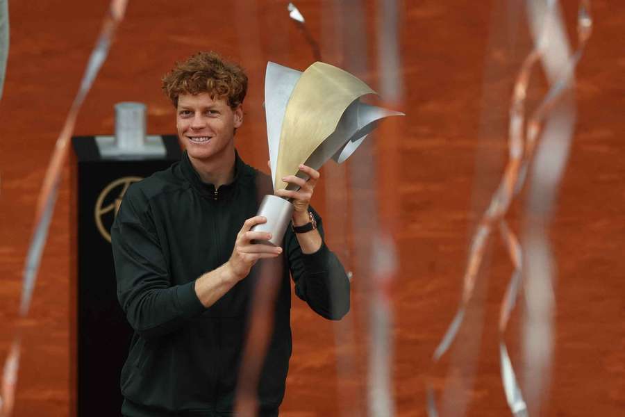 Sinner celebrates with his trophy