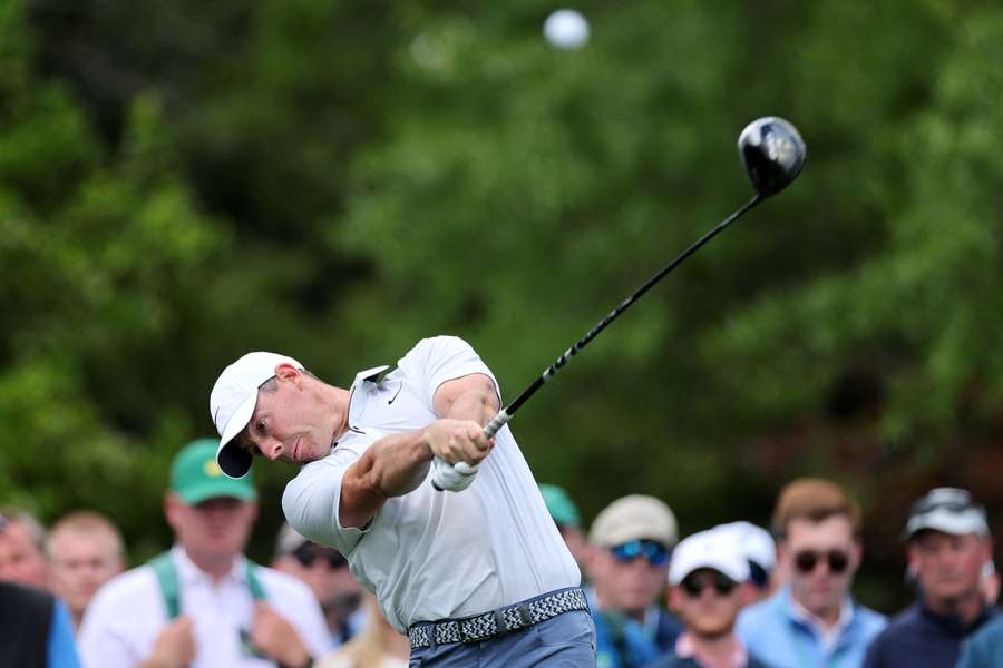 Rory McIlroy of Northern Ireland plays his shot from the fifth tee