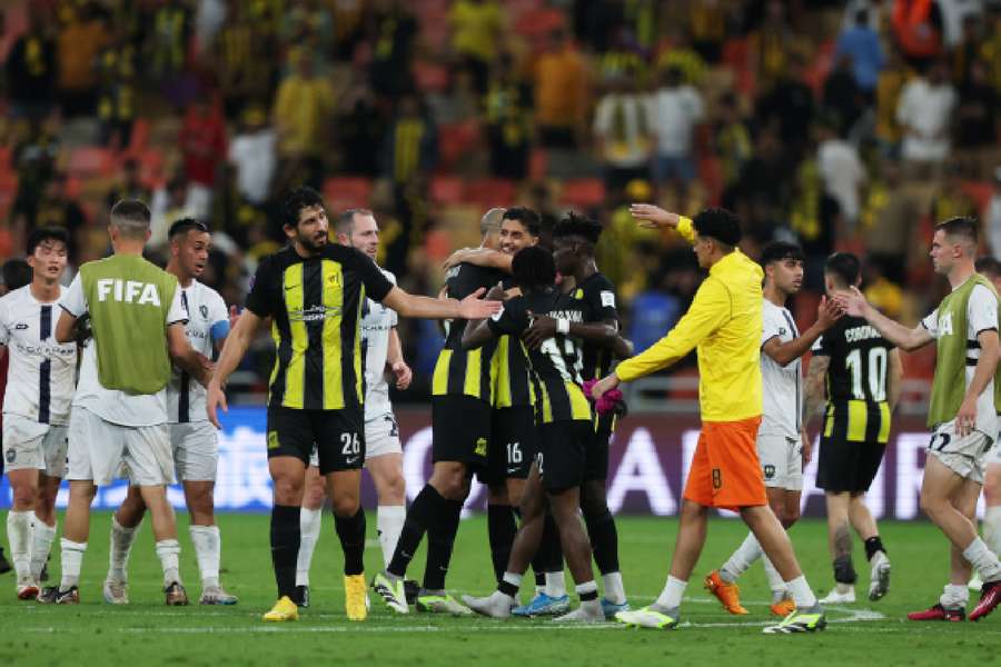 Al-Ittihad celebrate after beating Auckland City