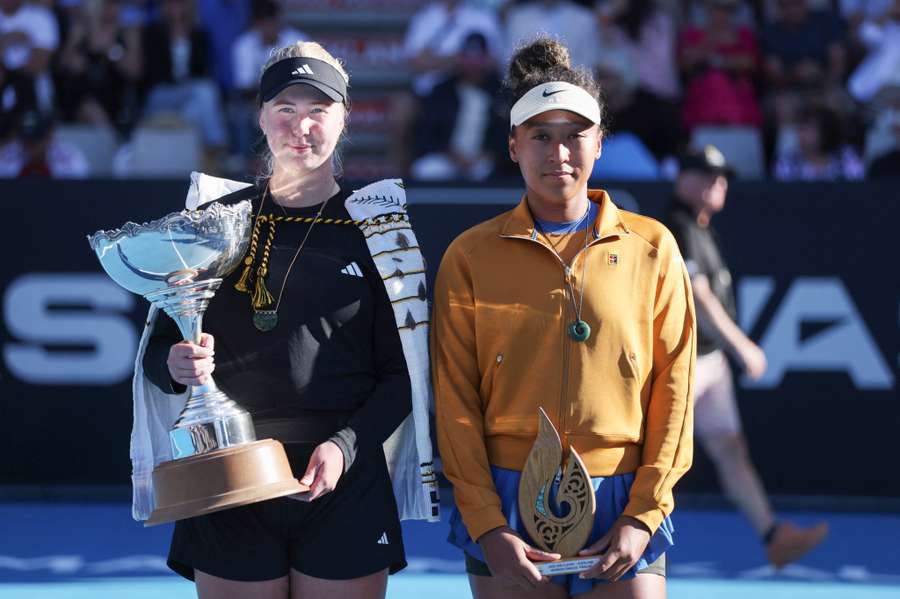 Tauson and Osaka with their trophies