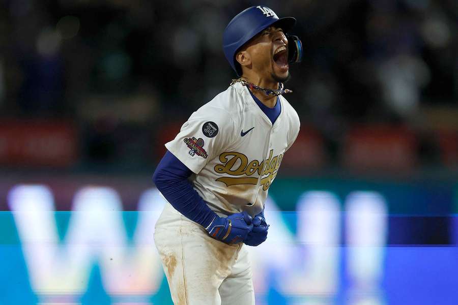 Los Angeles Dodgers star Mookie Betts celebrating as he rounds the bases after hitting a walk-off home run (2025)