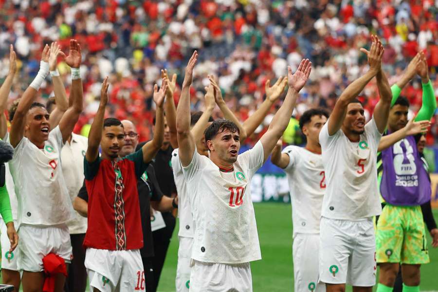 Morocco salute their fans after beating Canada to advance to the World Cup quarter-finals. Morocco salute their fans after beating Canada to advance to the World Cup quarter-finals.