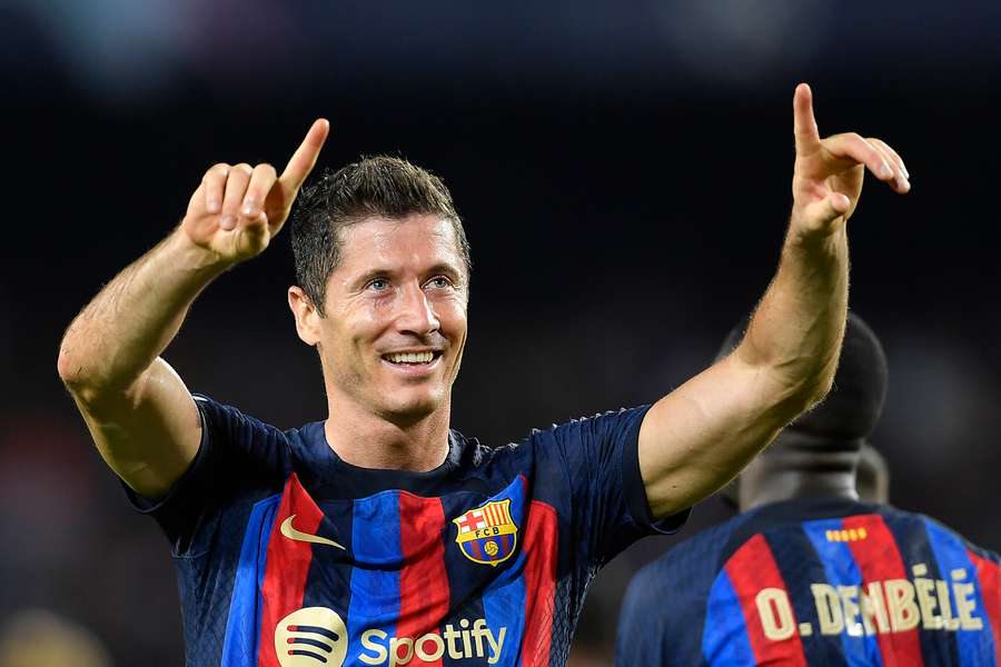 Barcelona's Polish forward Robert Lewandowski celebrates after scoring his team's third goal against Viktoria Plzen. 