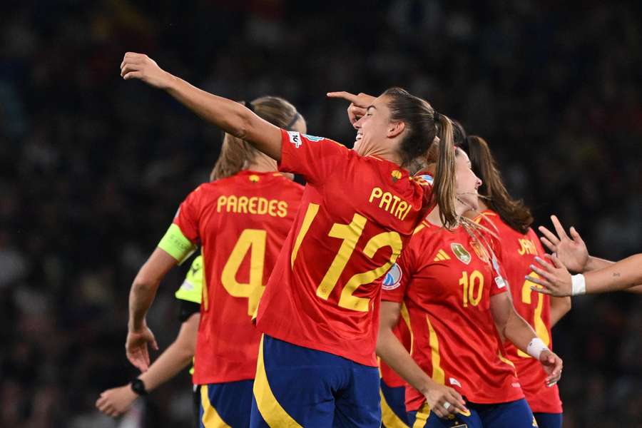 Patricia Guijarro celebrates with teammates after scoring Spain's second goal shortly after half-time