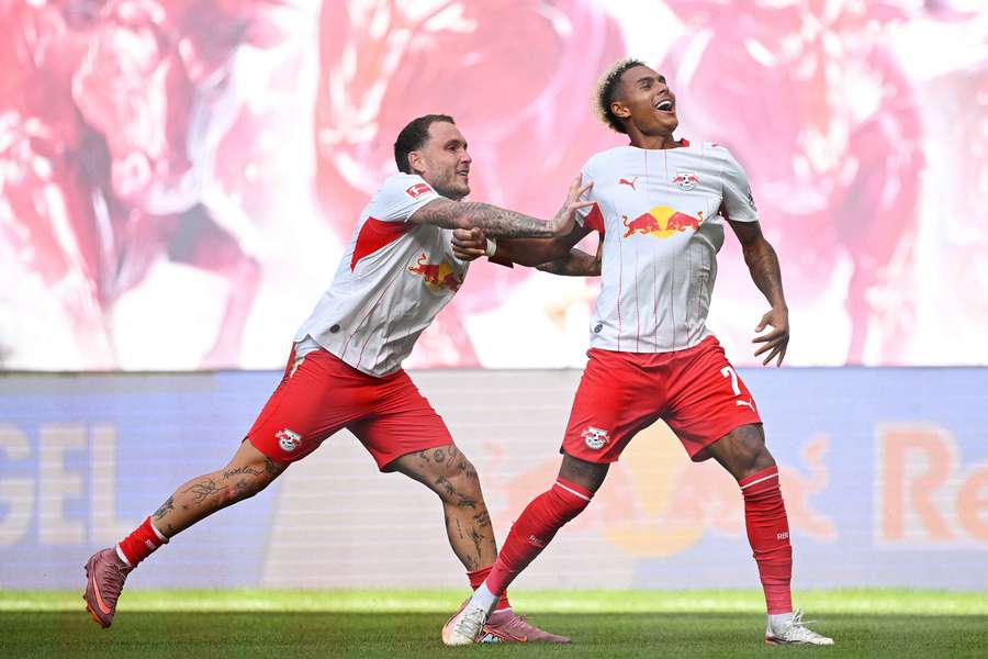 RB Leipzig's Antonio Nusa celebrates scoring their second goal with David Raum 