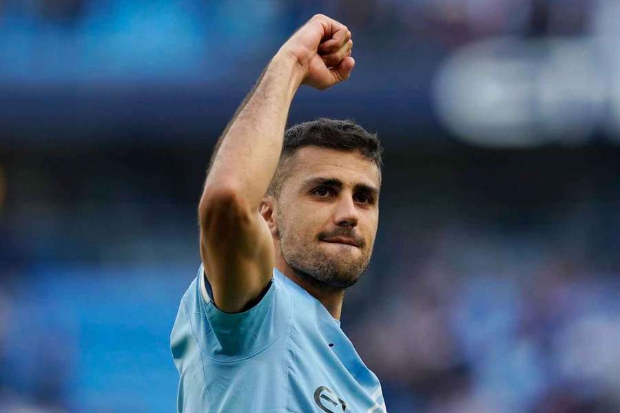 Rodri celebrates after Man City beat Arsenal