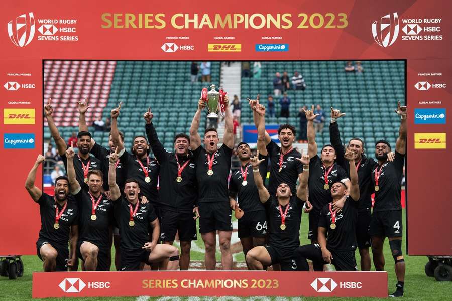 New Zealand players celebrate winning the 2023 men's Sevens Series title