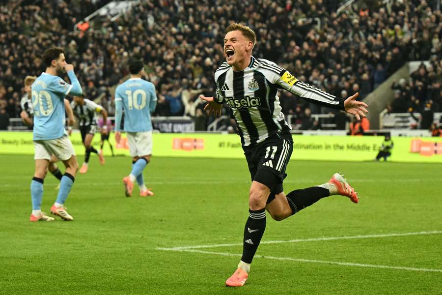 Harvey Barnes celebrates after scoring Newcastle's second goal against Man City