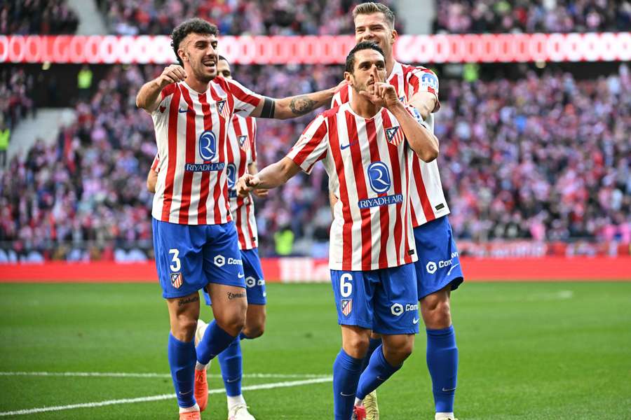 Atletico Madrid's Koke celebrates scoring against Valencia Atletico Madrid's Koke celebrates scoring against Valencia