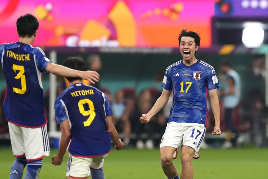 Ao Tanaka celebrates his goal