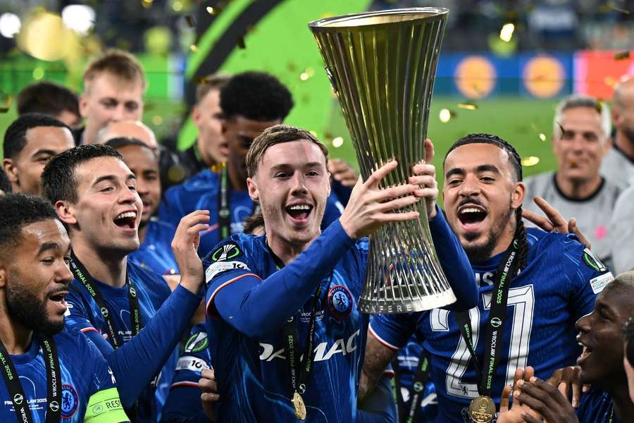Cole Palmer and his Chelsea team-mates lift the Conference League trophy