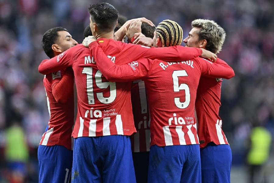 Atletico Madrid players celebrate together