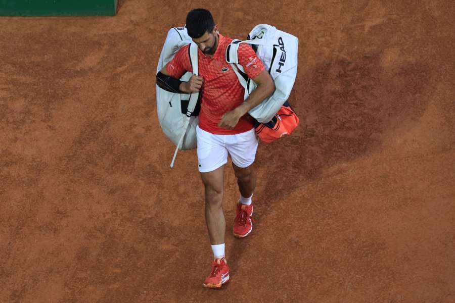 Serbia's Novak Djokovic leaves the court after losing against Italy's Lorenzo Musetti
