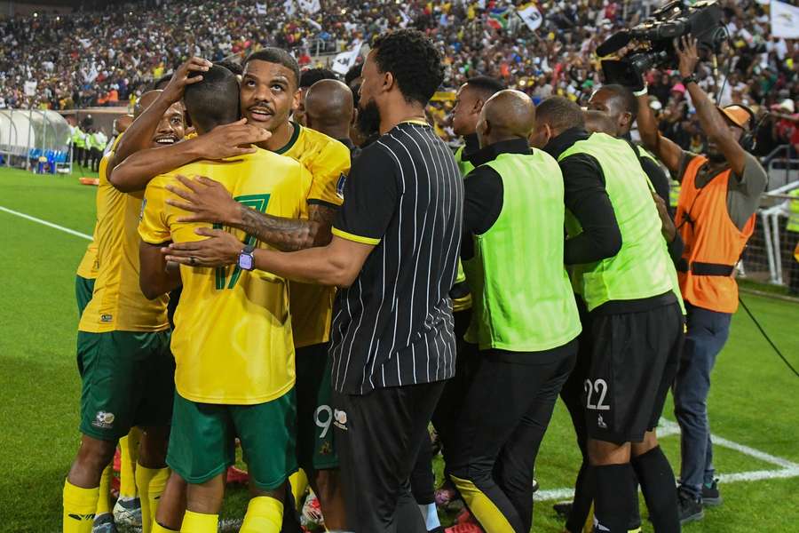 South Africa players celebrate after scoring against Lesotho at the Peter Mokaba Stadium in March