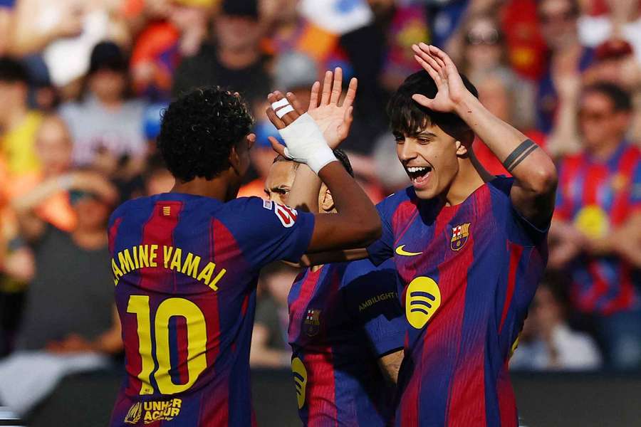 Marc Bernal celebrates his goal for Barcelona alongside Lamine Yamal