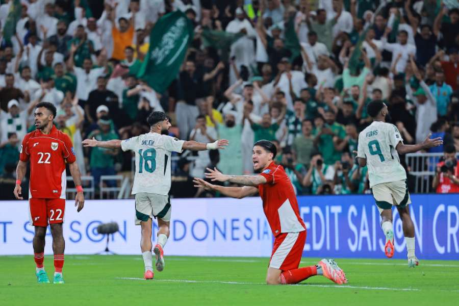 Al-Brikan celebrates scoring Saudi Arabia's third goal