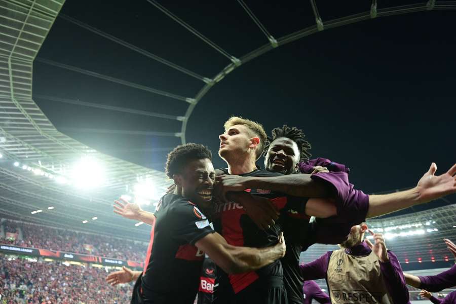Josip Stanisic celebrates after his last-minute goal confirmed Leverkusen's place in the Europa League final