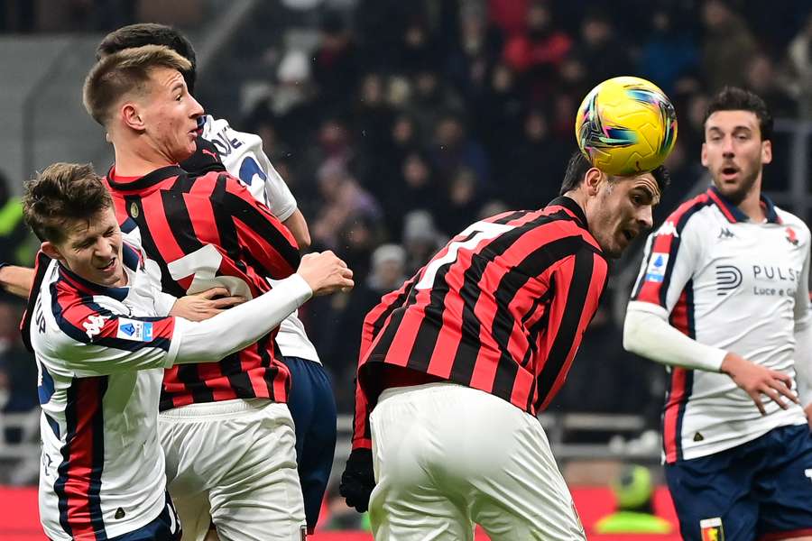 Alvaro Morata heads the ball during the Serie A match between AC Milan and Genoa at the San Siro