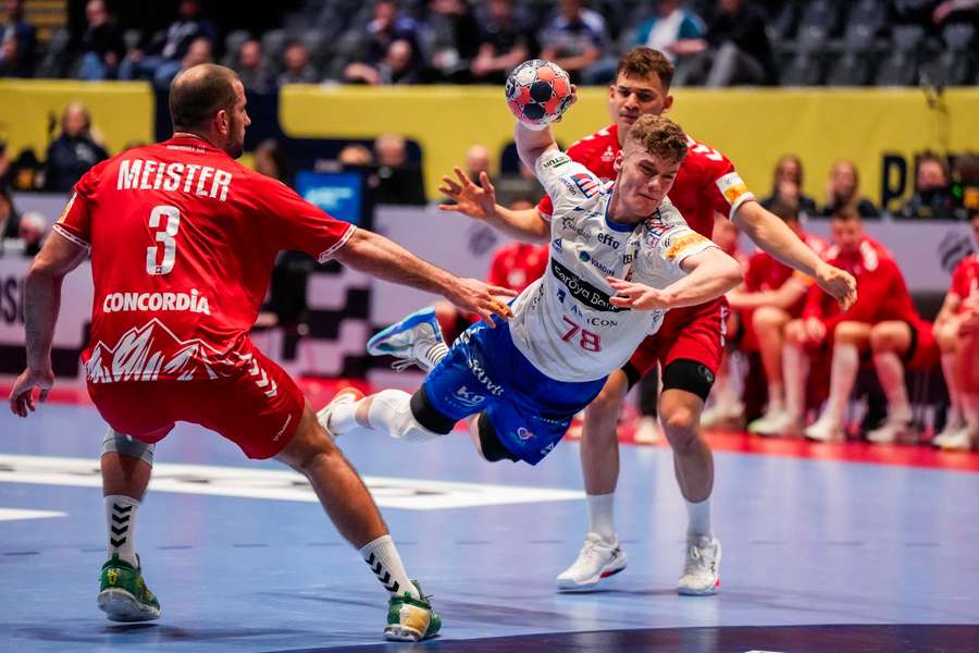 Faroe Islands' Oli Mittun in action against Switzerland's Lucas Meister during the thriller