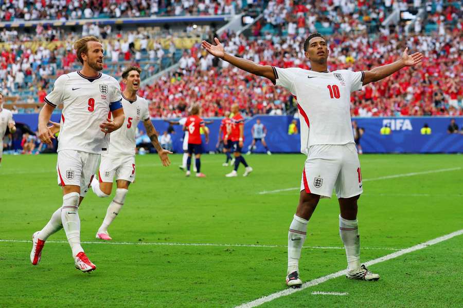 Jude Bellingham celebrates scoring his second goal of the match with Harry Kane and John Stones Jude Bellingham celebrates scoring his second goal of the match with Harry Kane and John Stones