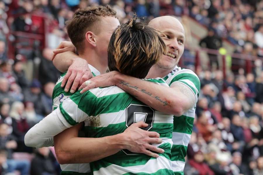 Celtic celebrate scoring their opening goal against Hearts
