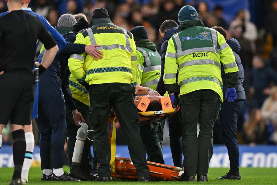 Cesar Azpilicueta is taken off on a stretcher after suffering an injury