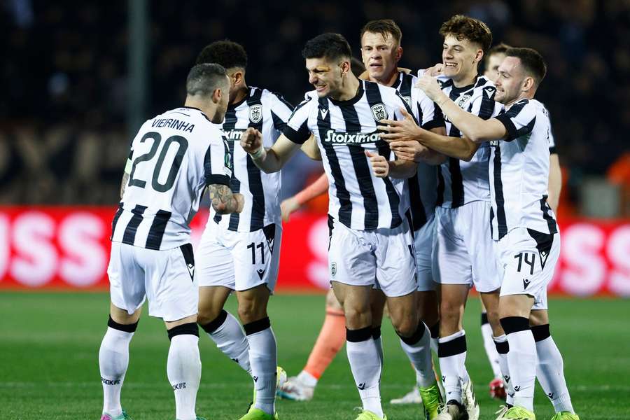 PAOK's players celebrate after scoring