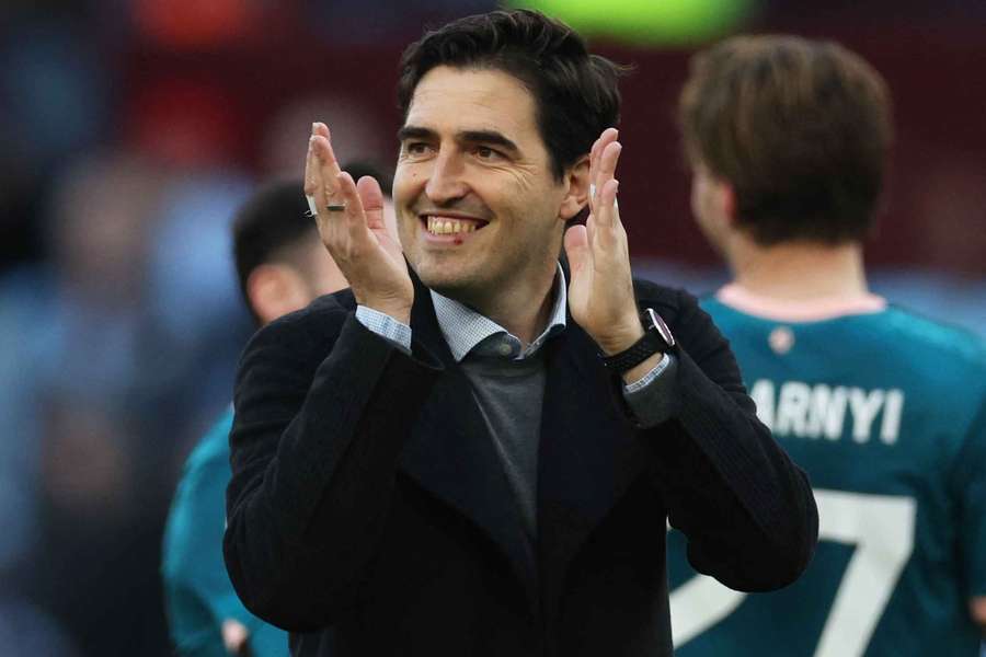 Bournemouth manager Andoni Iraola applauds fans after the match