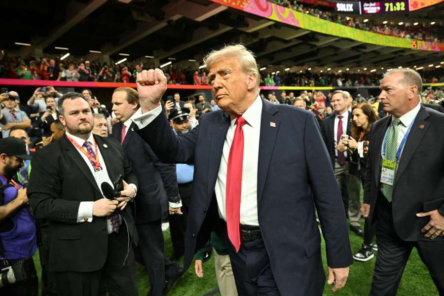 US President Donald Trump visits the field before the start of Super Bowl LIX