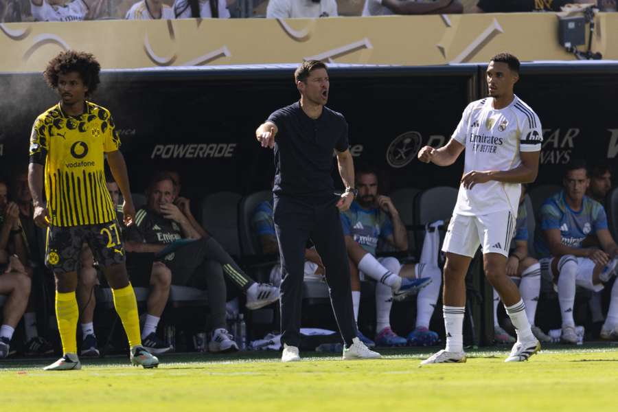 Alonso gives his side orders from the touchline