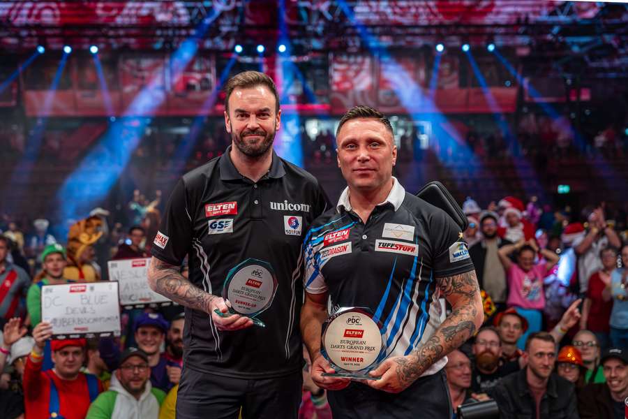 Price and Smith with their trophies