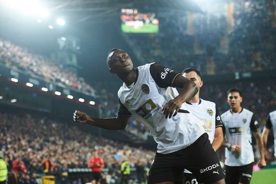 Umar Saqid celebrates scoring for Valencia