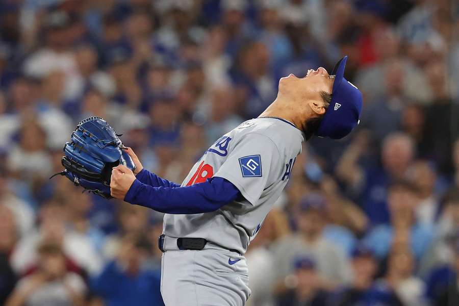 Yoshinobu Yamamoto of the Los Angeles Dodgers celebrates after defeating the Toronto Blue Jays in Game 7 of the World Series Yoshinobu Yamamoto of the Los Angeles Dodgers celebrates after defeating the Toronto Blue Jays in Game 7 of the World Series