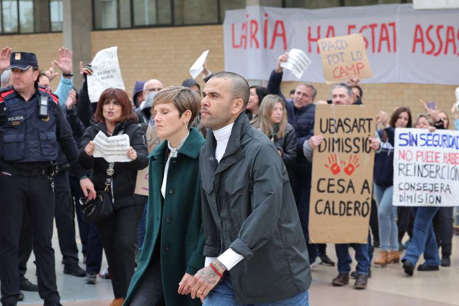 Hundreds of people rallied on Monday in Barcelona against a court ruling overturning Dani Alves' rape conviction