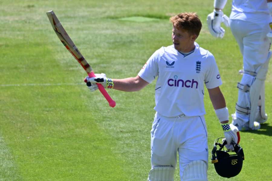 Ollie Pope reacts after reaching his hundred against Ireland