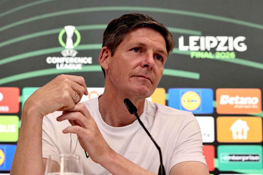 Glasner speaks during the press conference