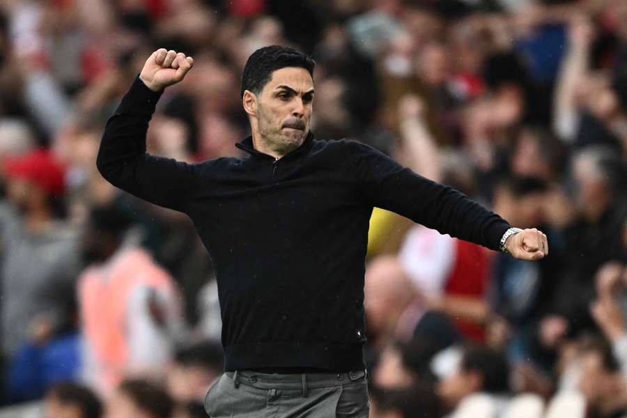 Mikel Arteta celebrates