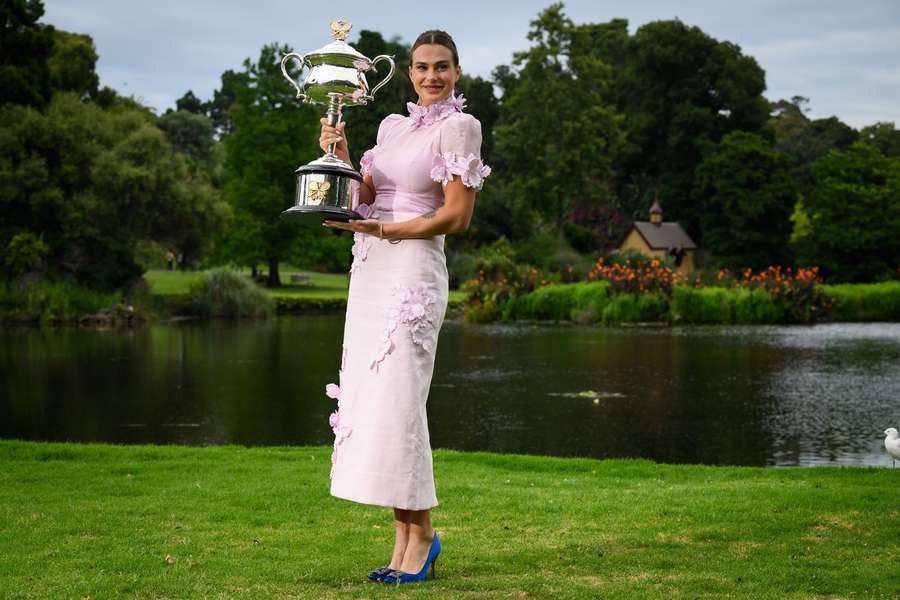 Aryna Sabalenka poses with her trophy