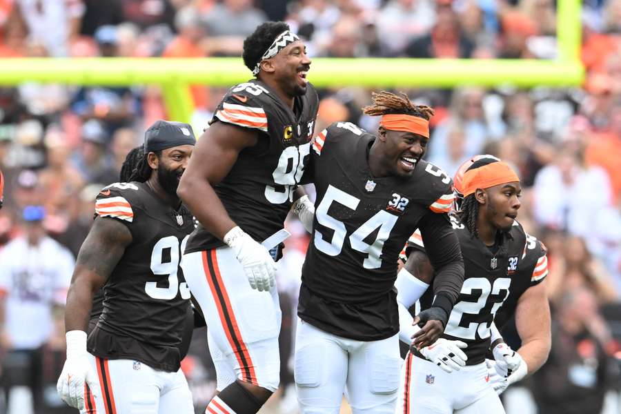 Ogbo Okoronkwo (54) with Cleveland Browns teammate Myles Garrett (95) (2023)