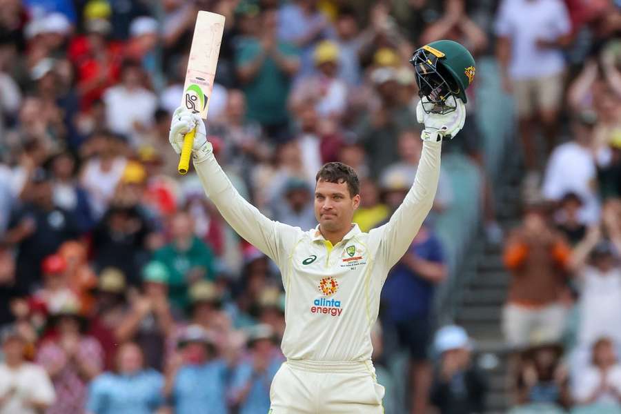 Carey celebrates his maiden test century