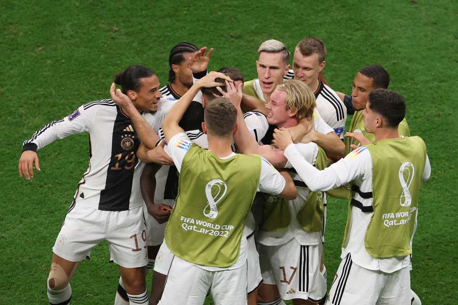 Germany celebrate with Niclas Fullkrug after his leveller