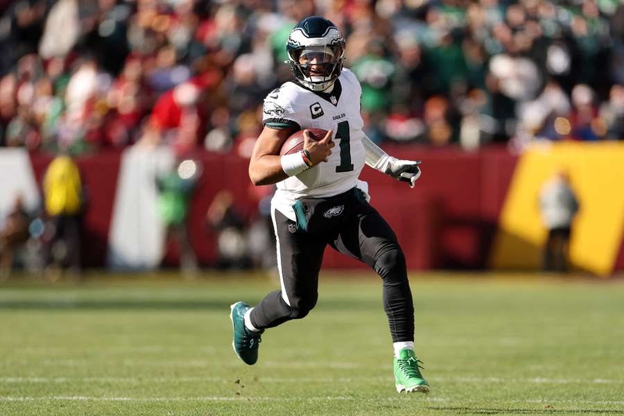 Philadelphia Eagles quarterback Jalen Hurts clears NFL concussion protocol ahead of team's playoff game.